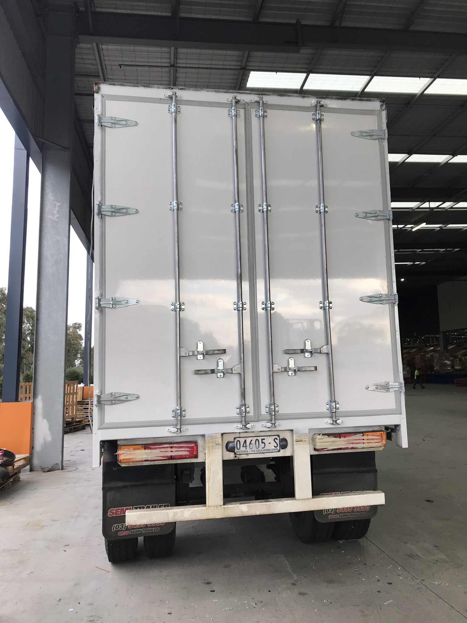 New painted rear barn doors on a trailer