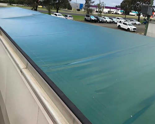 Roll over tarp on a trailer