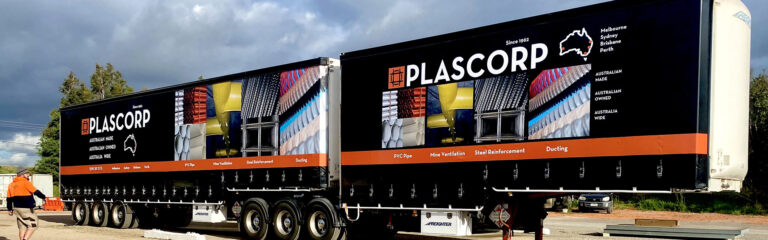 Plascorp B-double with printed tautliner curtains